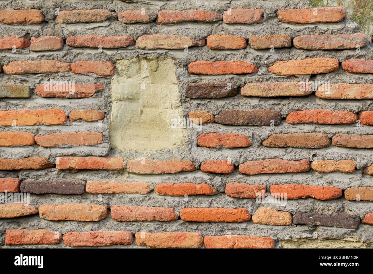 Old grunge brick wall as a background Stock Photo - Alamy