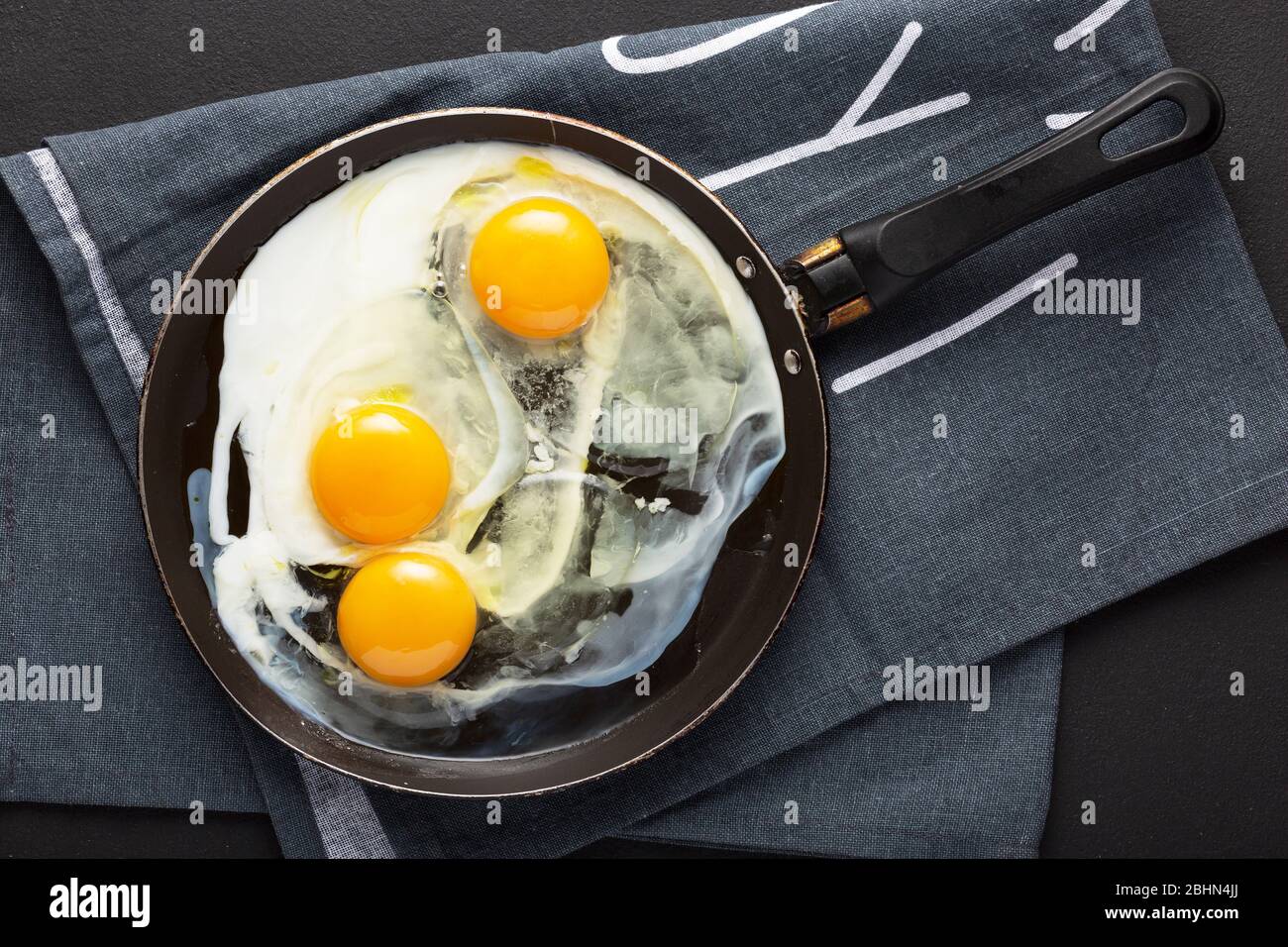 frying pan, sunny side, breakfast, scrambled egg, cast iron, over easy, cooked egg Stock Photo