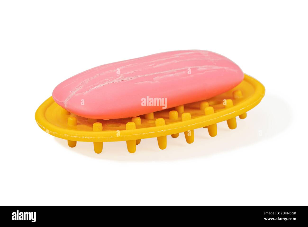 yellow soap dish on white Stock Photo
