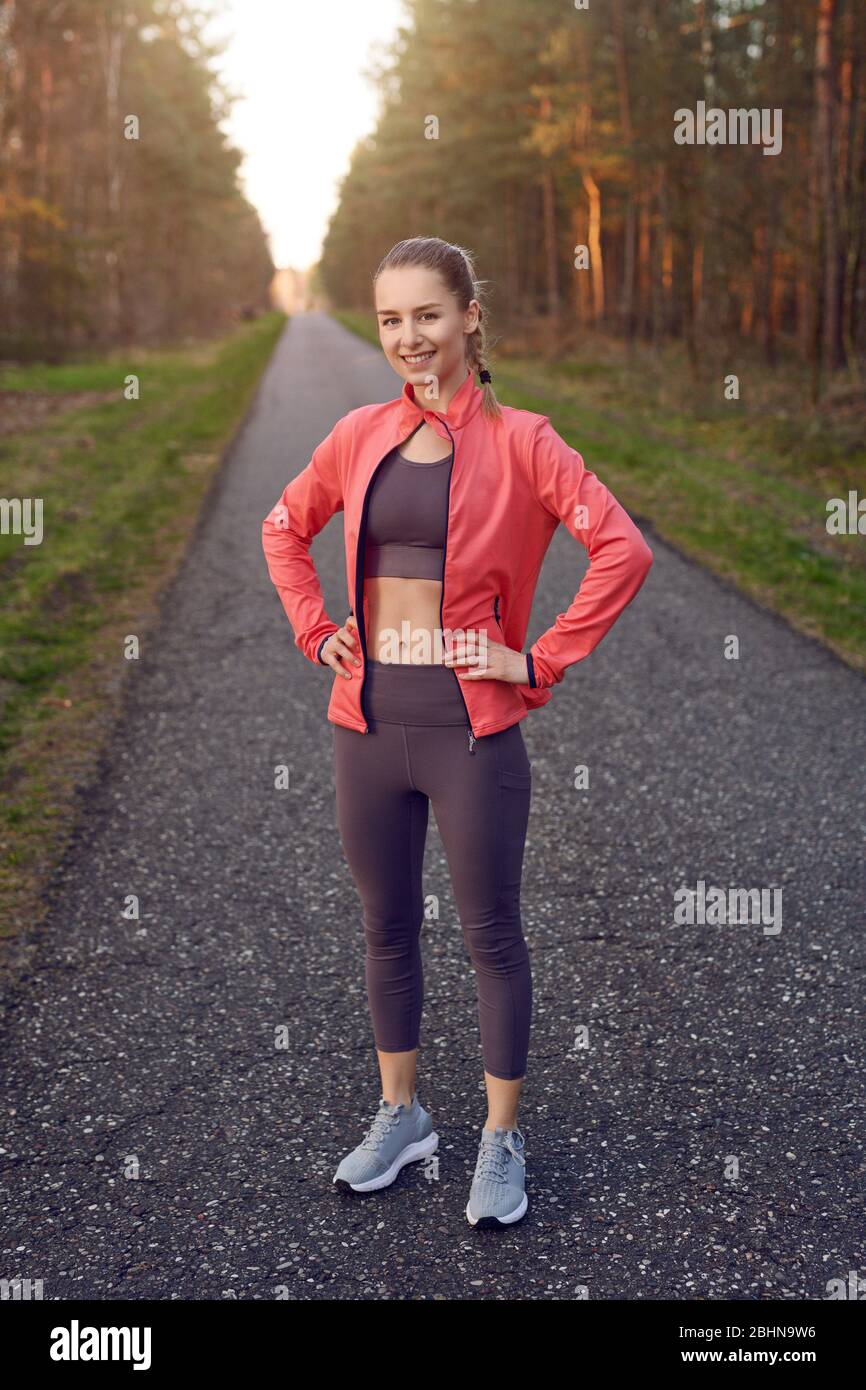 Red jacket top grey pants
