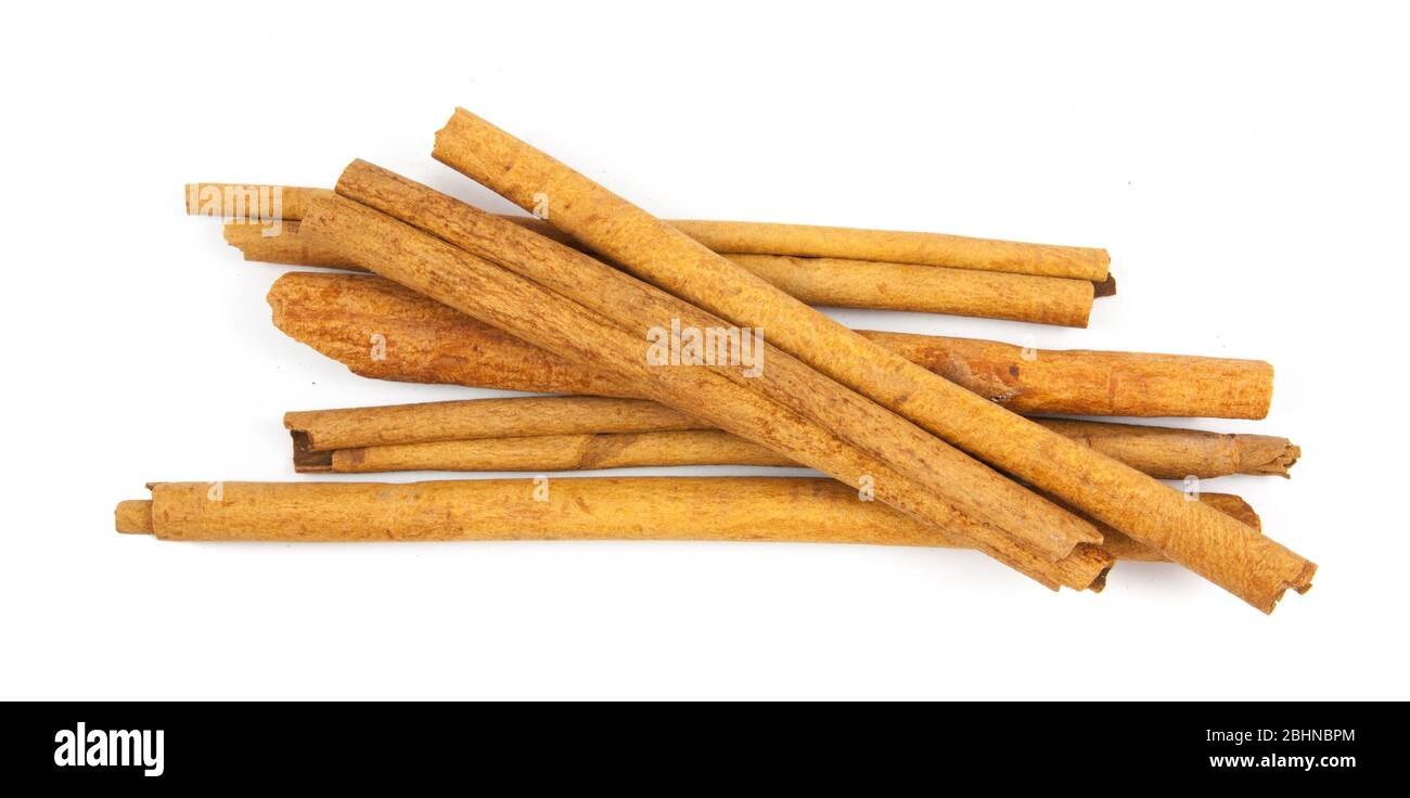 cinnamon ingredients close up isolated on white background Stock Photo