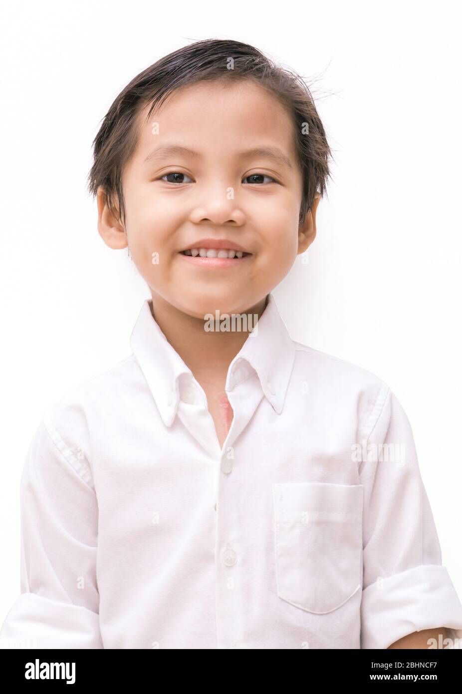 white shirt on little smart asian boy Stock Photo - Alamy
