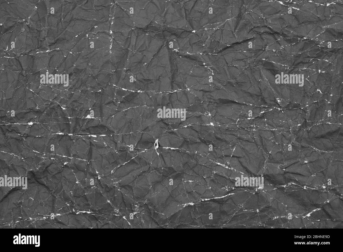 black crumpled paper texture wallpaper background Stock Photo - Alamy