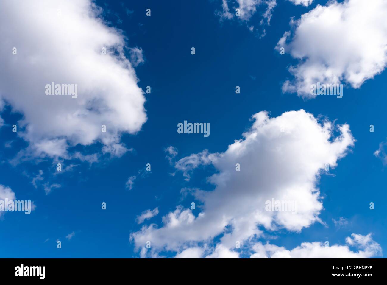 Clouds in a blue sky Stock Photo Alamy