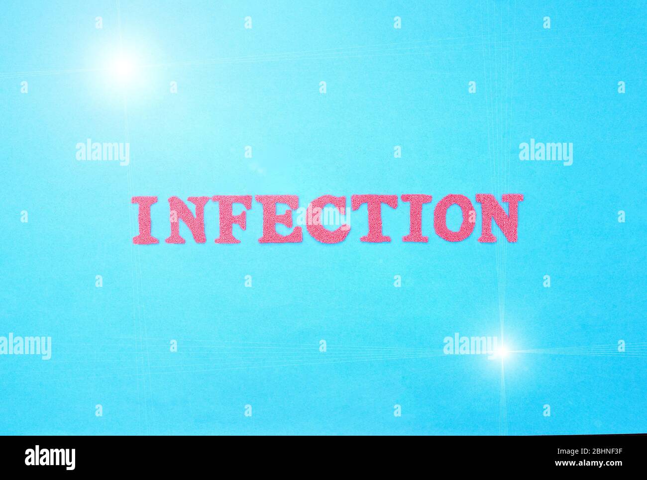 The word infection in red letters on a blue background. The concept of sexually transmitted and respiratory infections, rotavirus Stock Photo