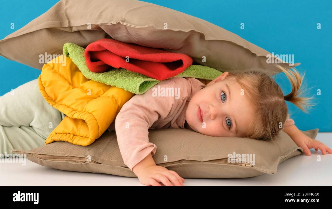 Cute, Adorable, Smiling, Caucasian Baby in a Pile Stock Photo