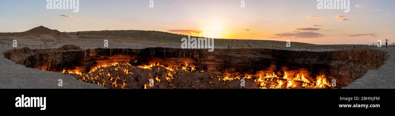Panorama of th fire of the Darwaza  (Derweze) gas crater in the Karakum Desert in Turkmenistan. Stock Photo
