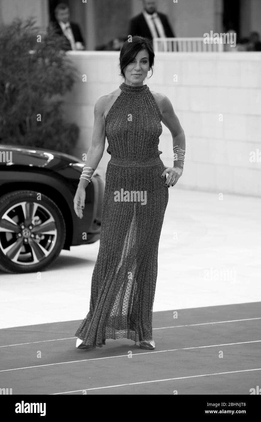VENICE, ITALY - SEPTEMBER 06: Paola Turci walk the red carpet ahead of the 'Capri-Revolution' screening during the 75th Venice Film Festival Stock Photo