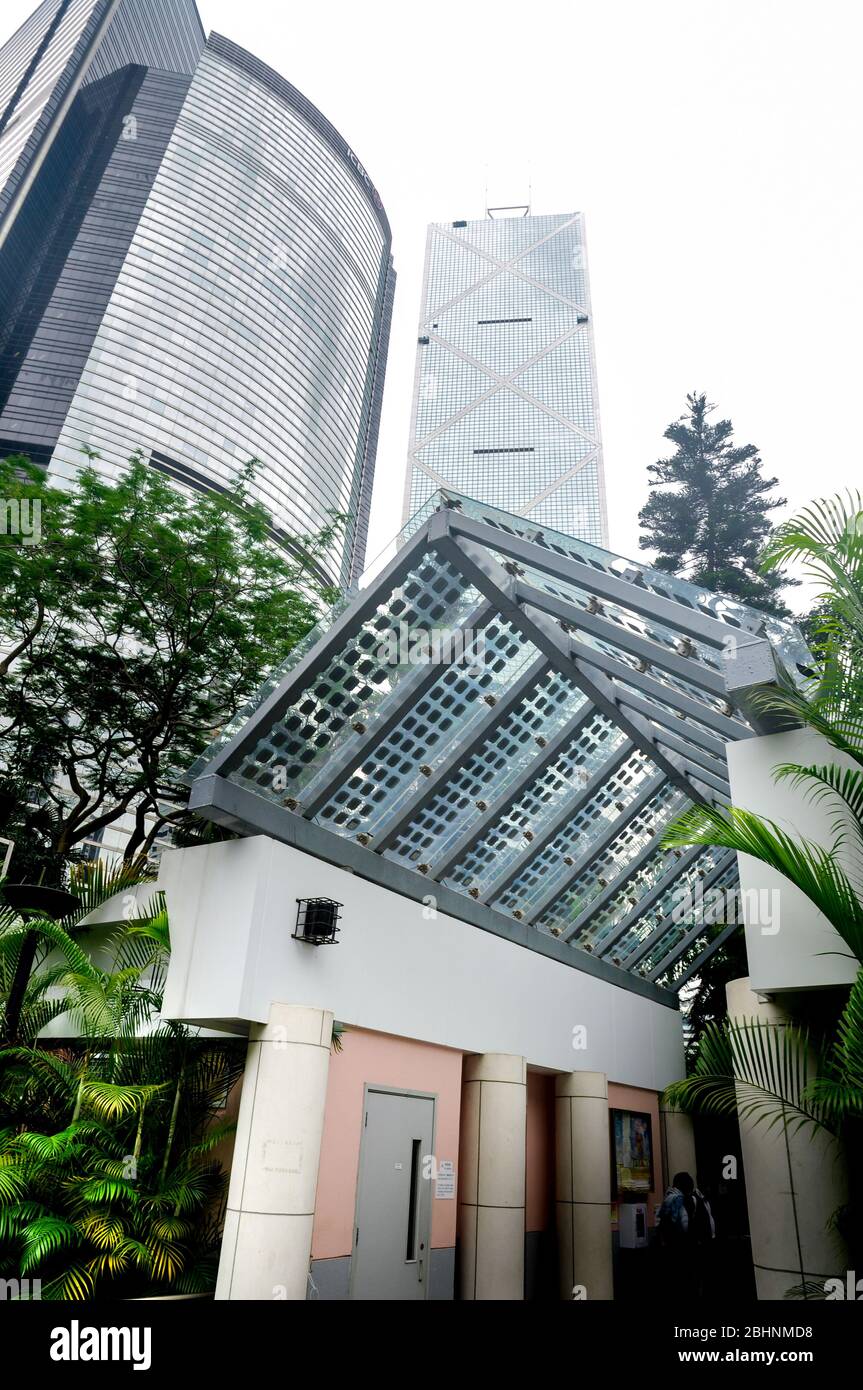 Entrance of the Hong Kong Natural park with the  Bank of China building and Citibank Tower in background Stock Photo