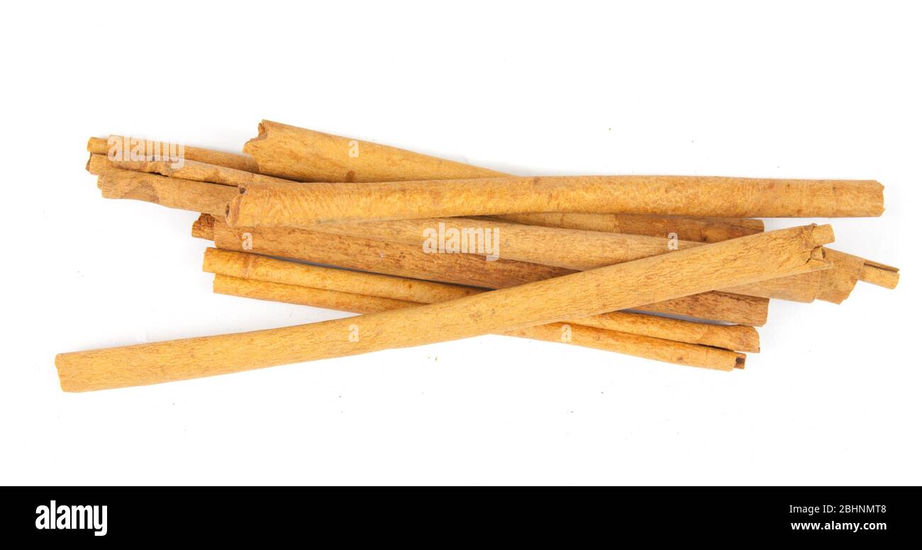 cinnamon ingredients close up isolated on white background Stock Photo