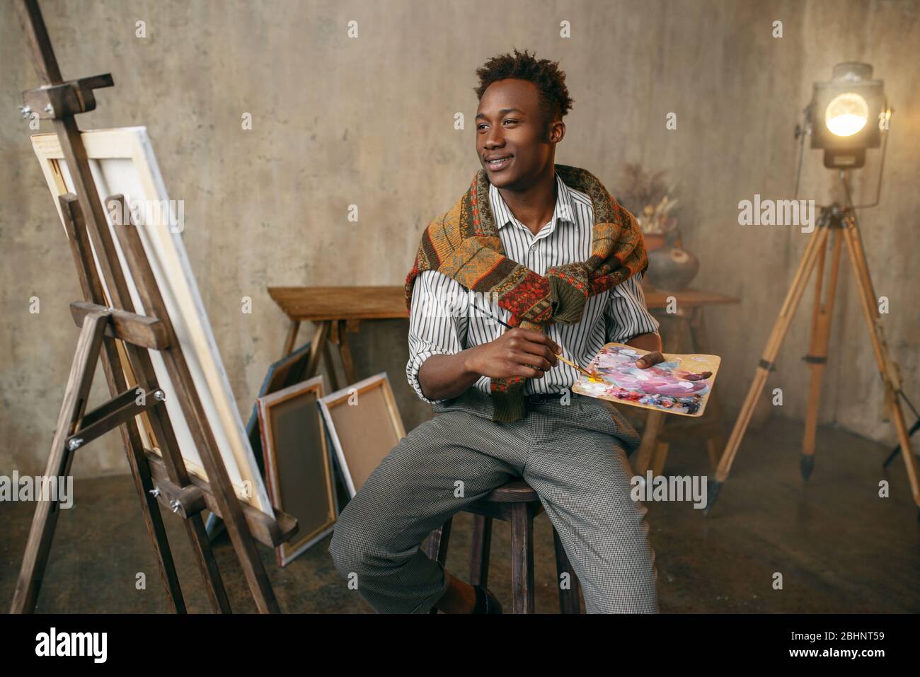 Male artist palette brush hi-res stock photography and images - Alamy