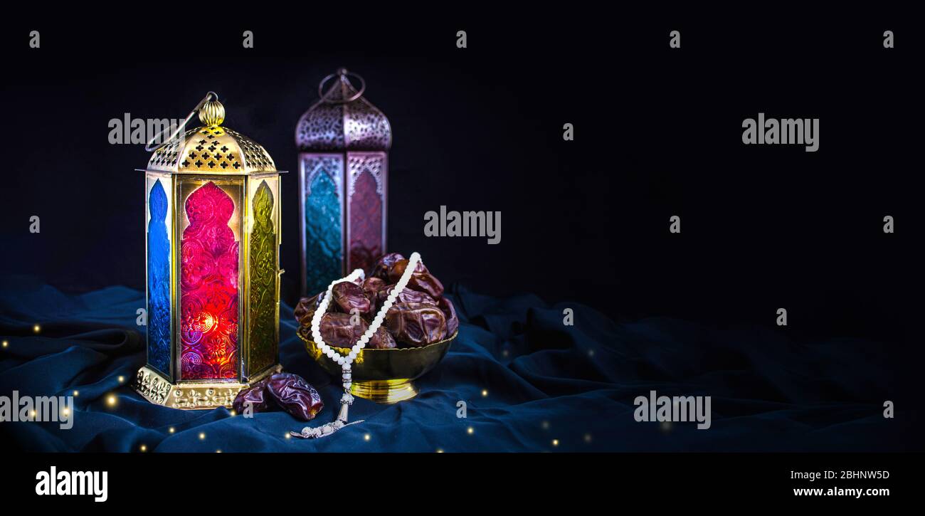 Ramadan Background  2020 special Islamic photos, new colorful ramadan mubarak isolated with black background arabic light lamp with dates and tasbeeh Stock Photo