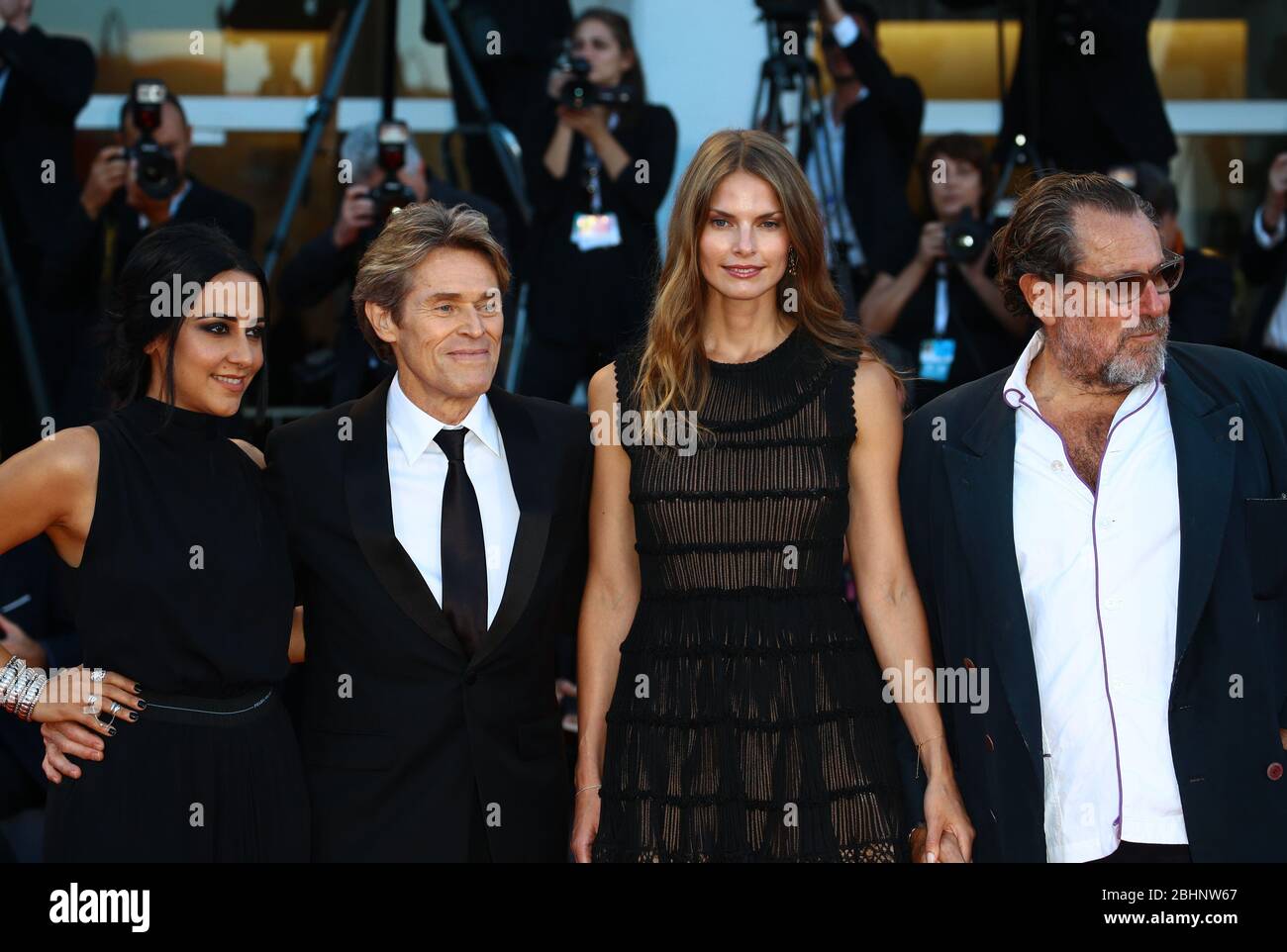 VENICE, ITALY - SEPTEMBER 08: Julian Schnabel, Louise Kugelberg, Willem Dafoe and Giada Colagrande  walk the red carpet ahead of the Award Ceremony Stock Photo