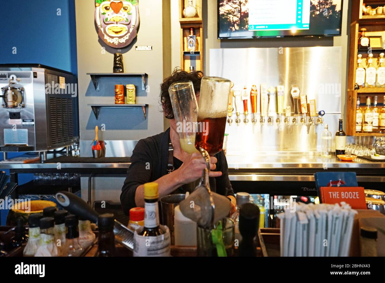 Bartender making a cocktail at 'MISSION TACO JOINT at Streets of St