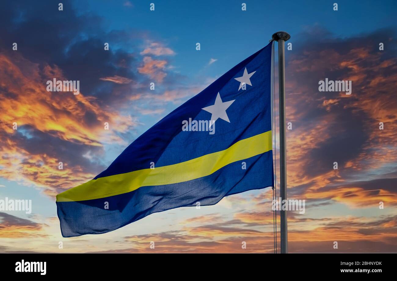 Curacao Flag Against Sunset Sky Stock Photo