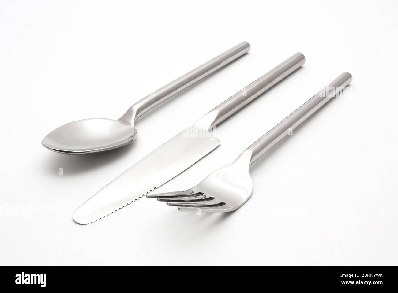 cutlery set with fork knife and spoon on white Stock Photo - Alamy