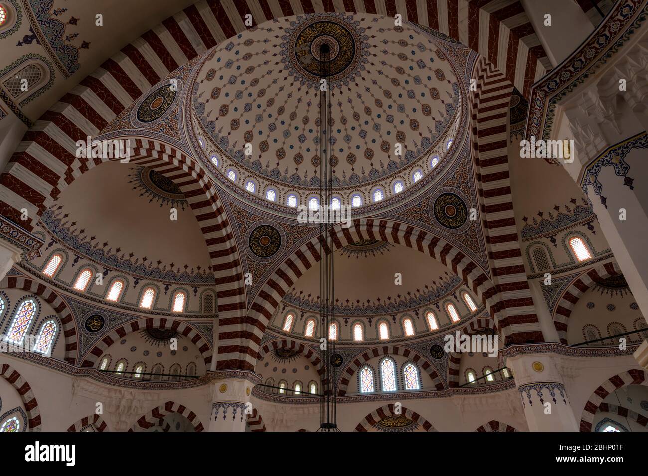 Ashgabat, Turkmenistan - June 1, 2019: Interior of the Ertugrul Gazi Mosque, courtyard, in the white and marble city of Asjchabad with great buildings Stock Photo