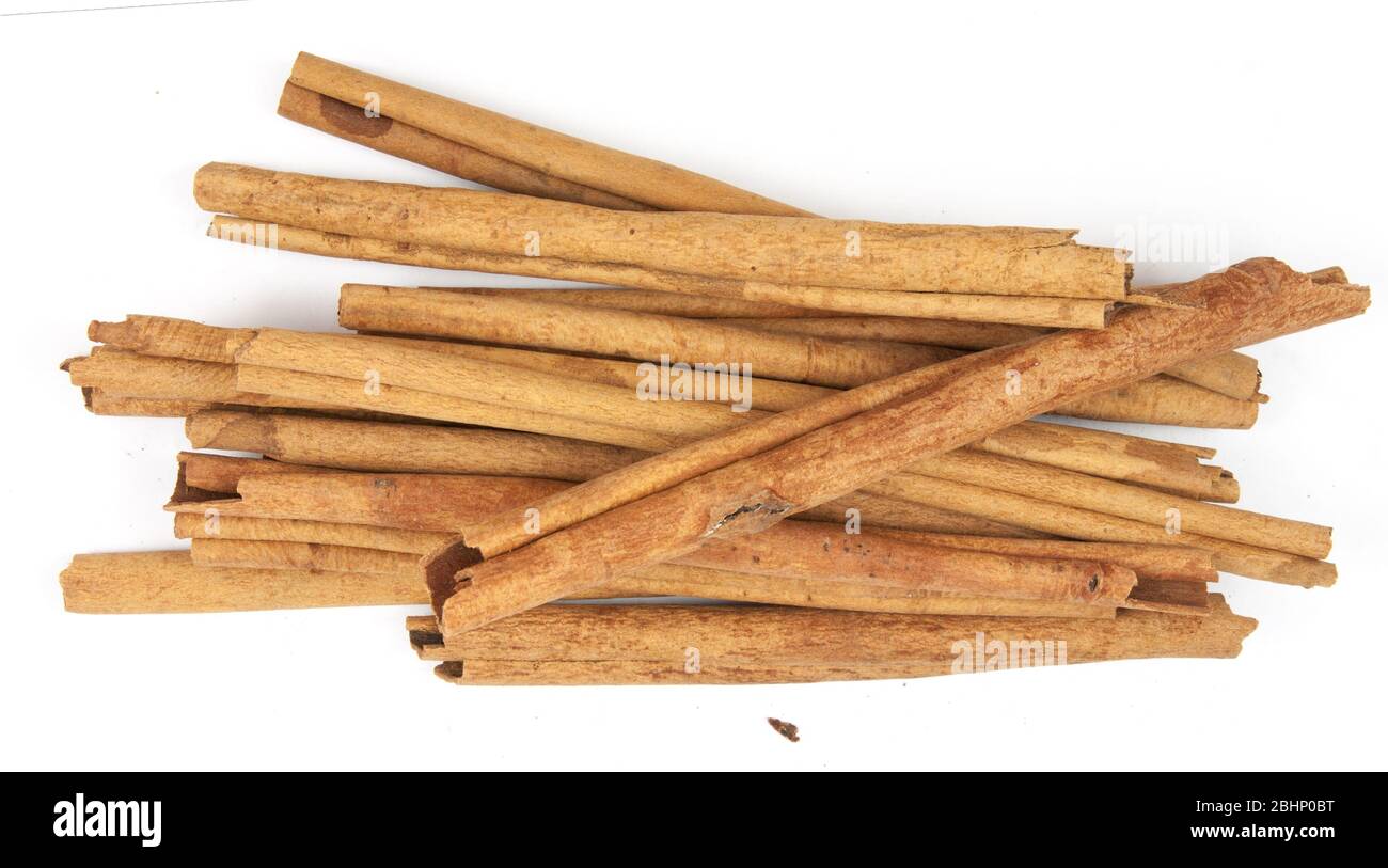 cinnamon ingredients close up isolated on white background Stock Photo