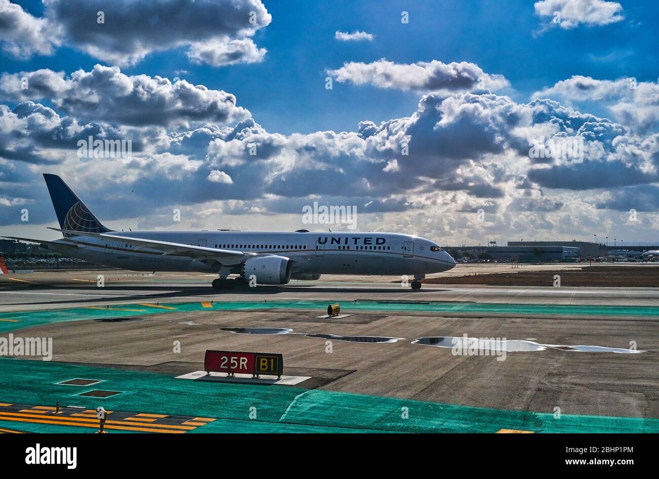 United Airlines on Sunny Runway Stock Photo