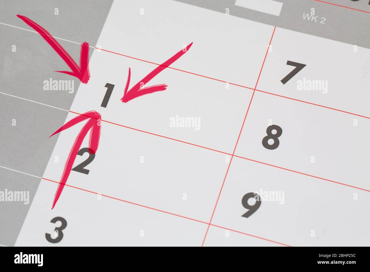 1st Date of the Month marked in red marker pen on a simple planner ...