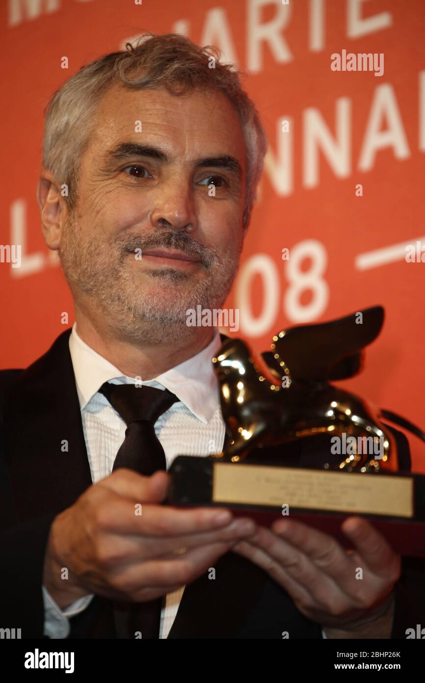 VENICE, ITALY - SEPTEMBER 08: Alfonso Cuaron poses with Golden Lion for the best movie for 'Roma' Photocall during the 75th Venice Film Festival Stock Photo