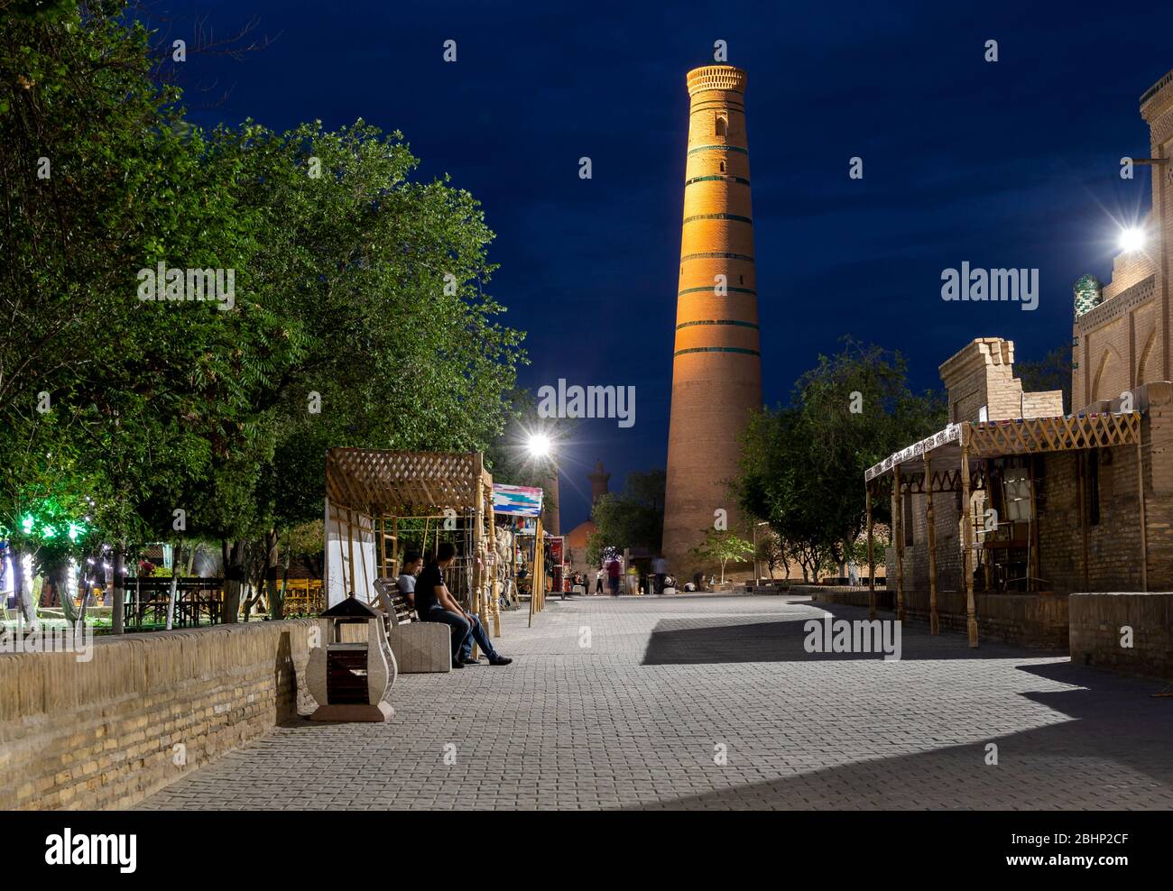 Khiva, Uzbekistan - June 5, 2019: Evening in  Itchan Kala with people in the old city centre of Khiva in Uzbekistan. Stock Photo