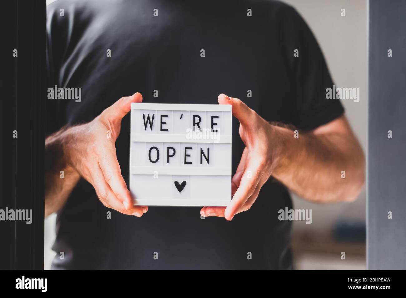 Welcoming guests door hi-res stock photography and images - Alamy