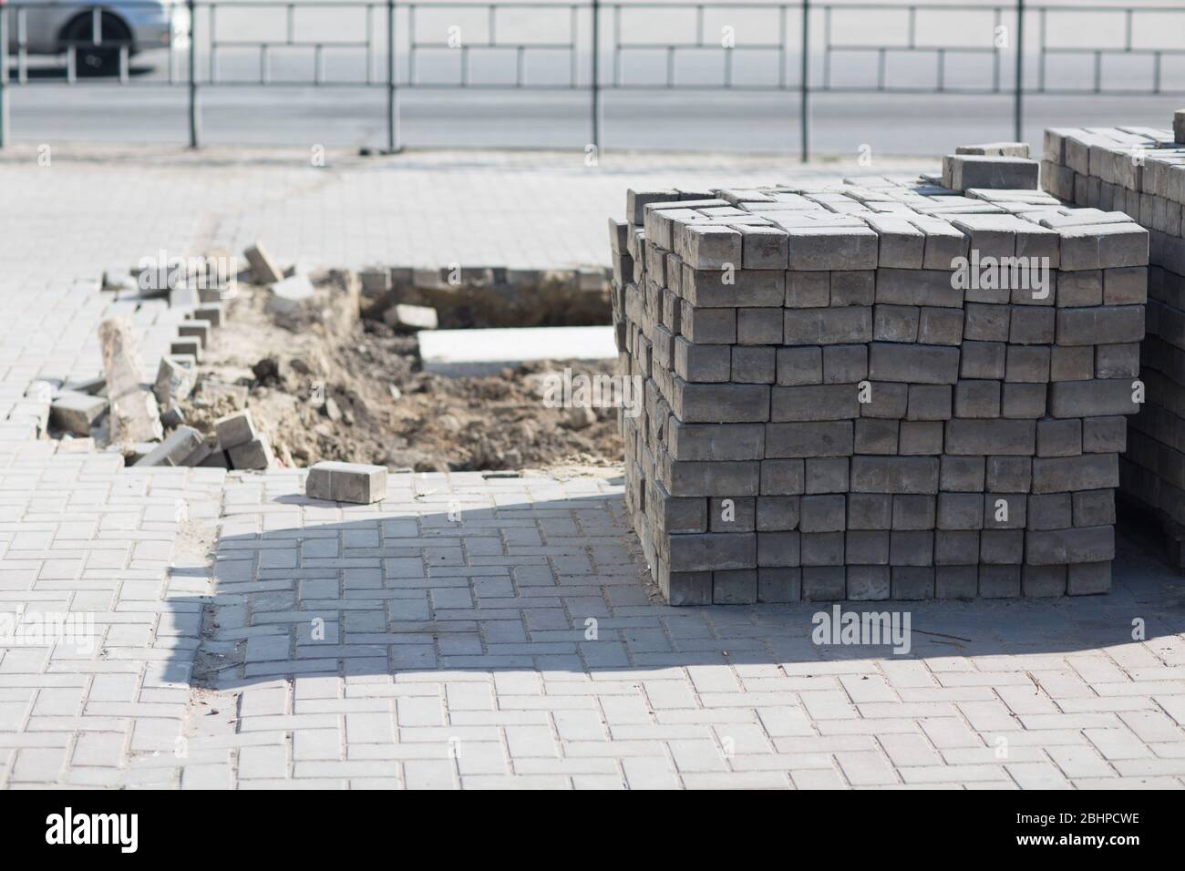 Stacked road tiles. Broken surface. Stock Photo