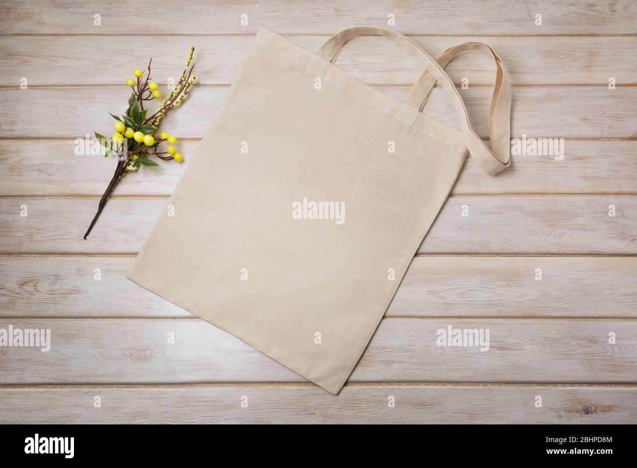Download Canvas Tote Bag Mockup With Yellow Plant Branch Empty Tote Bag Mock Up For Branding Presentation Stock Photo Alamy PSD Mockup Templates