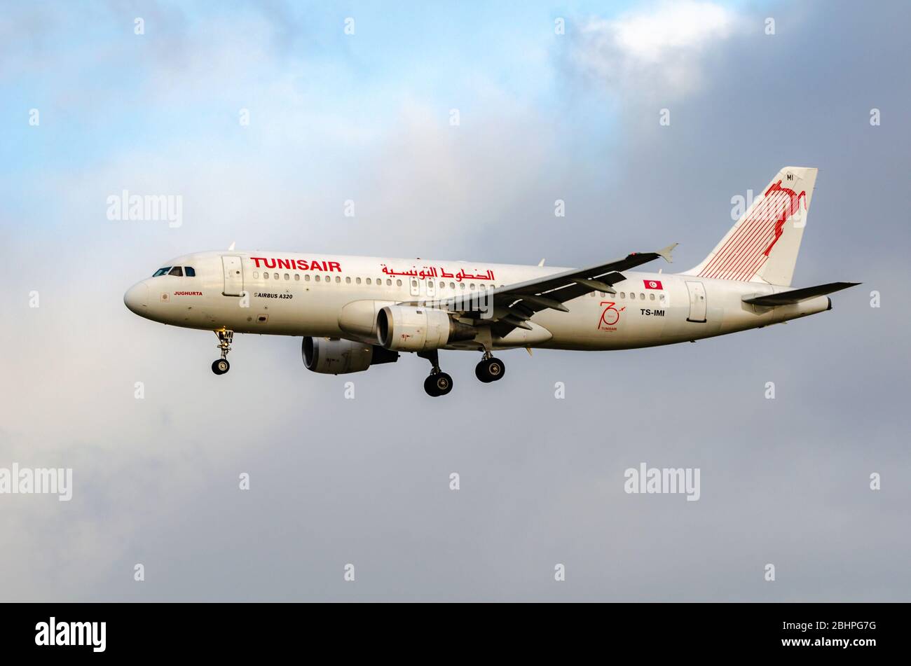 FRANKFURT, HESSE GERMANY - DECEMBER 23: Airbus A320 of Tunisair arriving at Frankfurt airport. Tunisair is the flag carrier airline of Tunisia. Stock Photo
