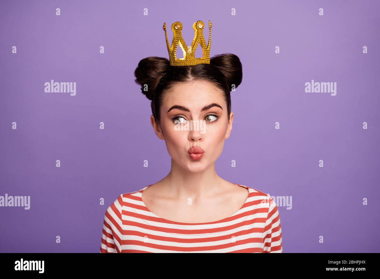Closeup photo of pretty lady prom queen famous person sending air kisses king and citizens wear golden tiara white red casual striped shirt isolated Stock Photo