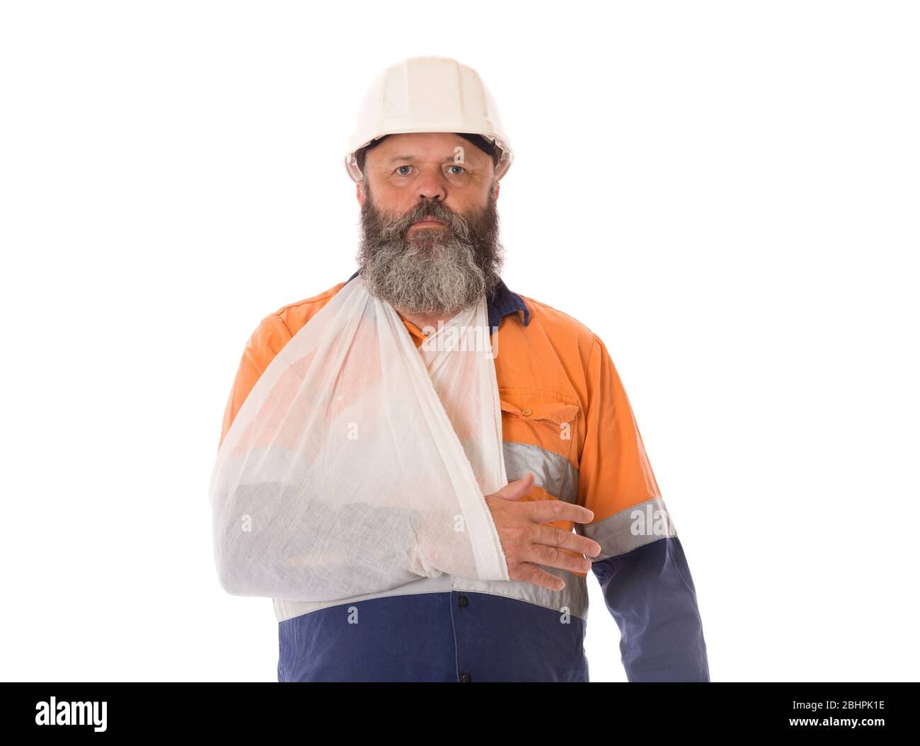 An industrial worker with arm in sling. Stock Photo