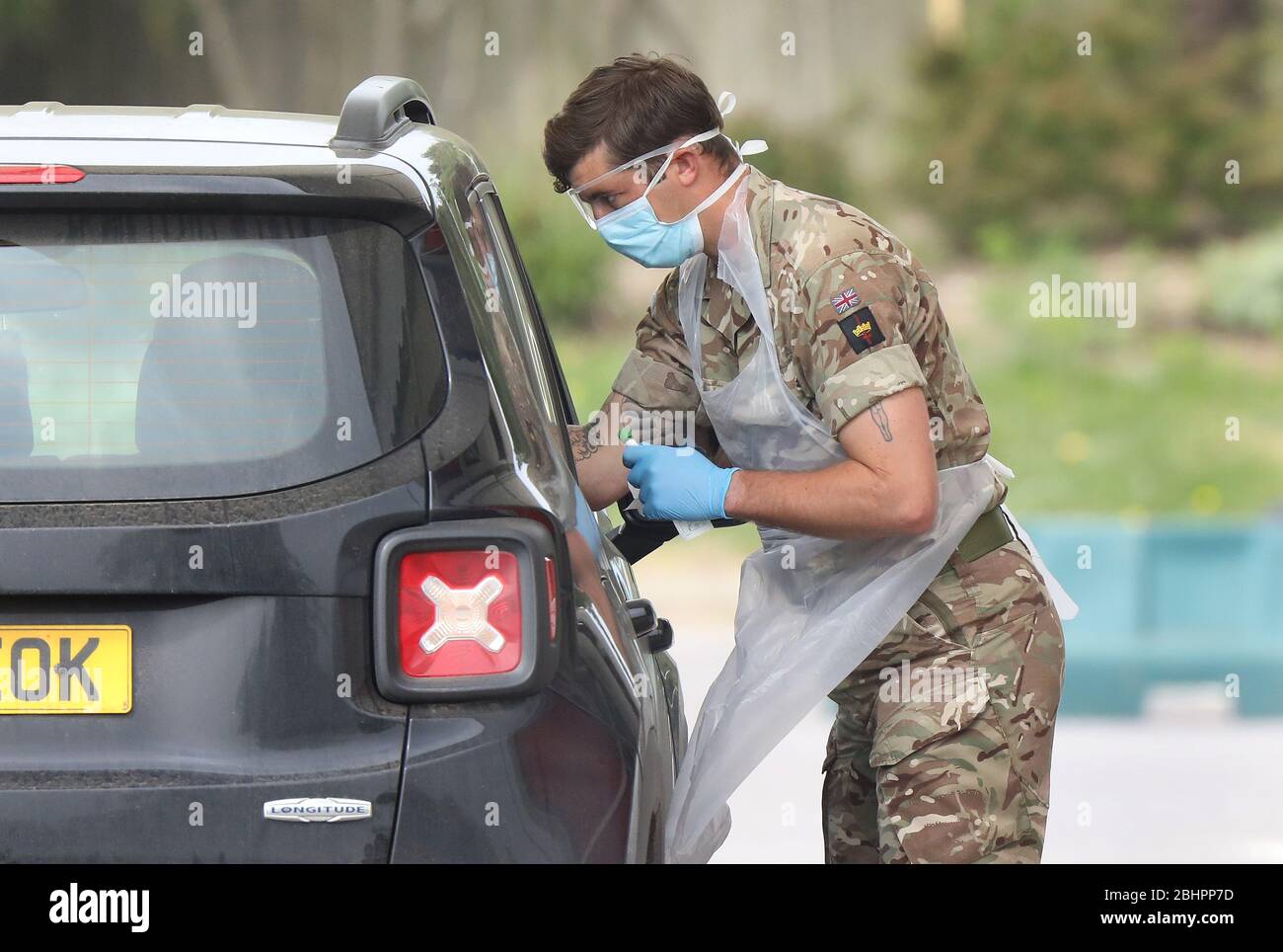 Chessington, UK. 27th Apr, 2020. Military personnel test NHS staff at a