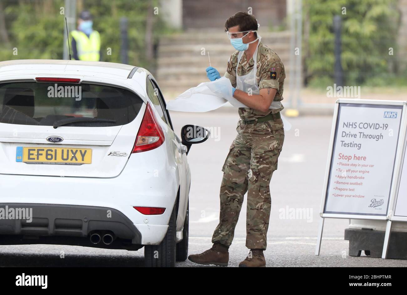 Chessington, UK. 27th Apr, 2020. Military personnel test NHS staff at a