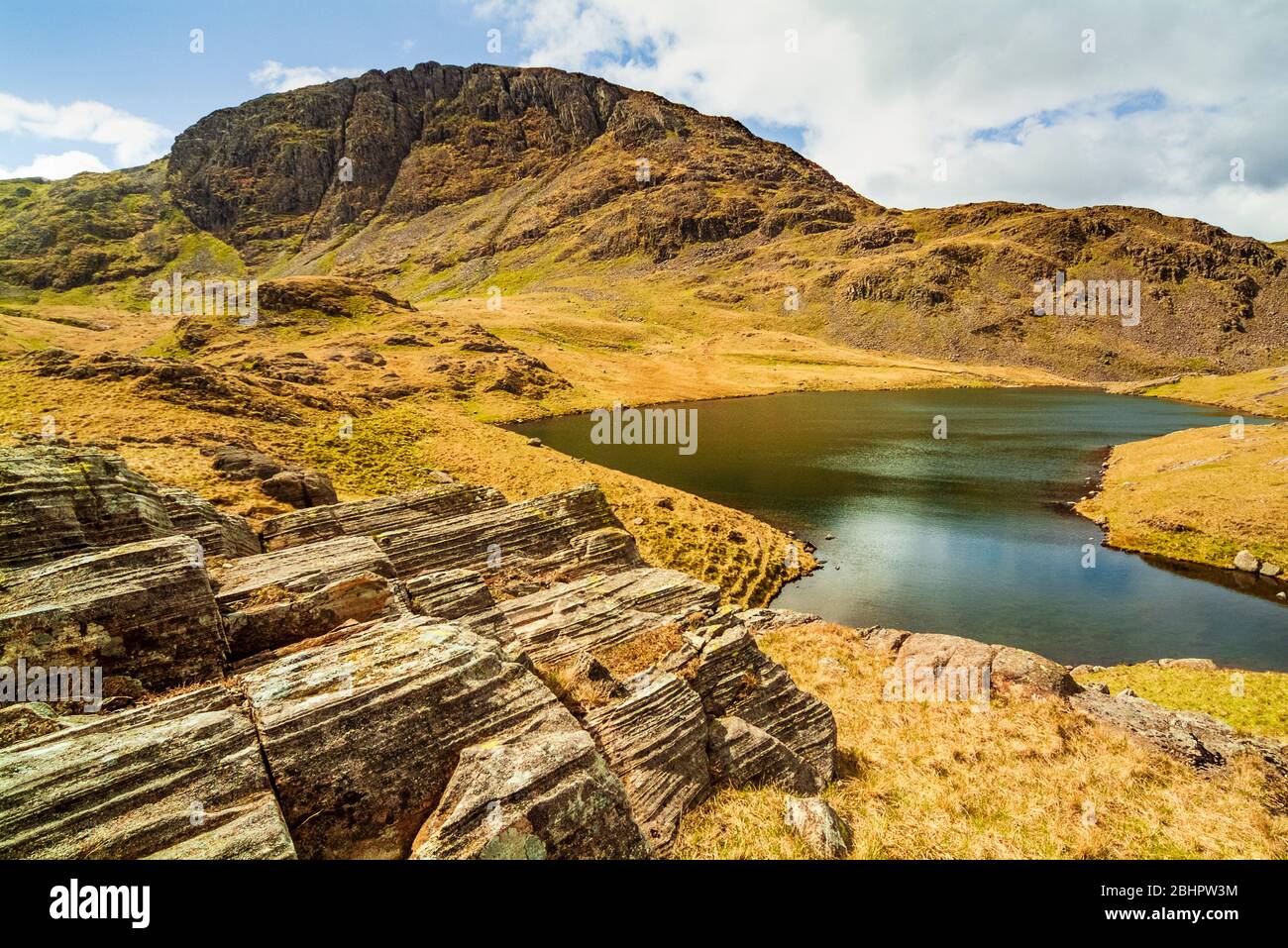 Sprinkling Tarn and Great End in the Lake District Stock Photo