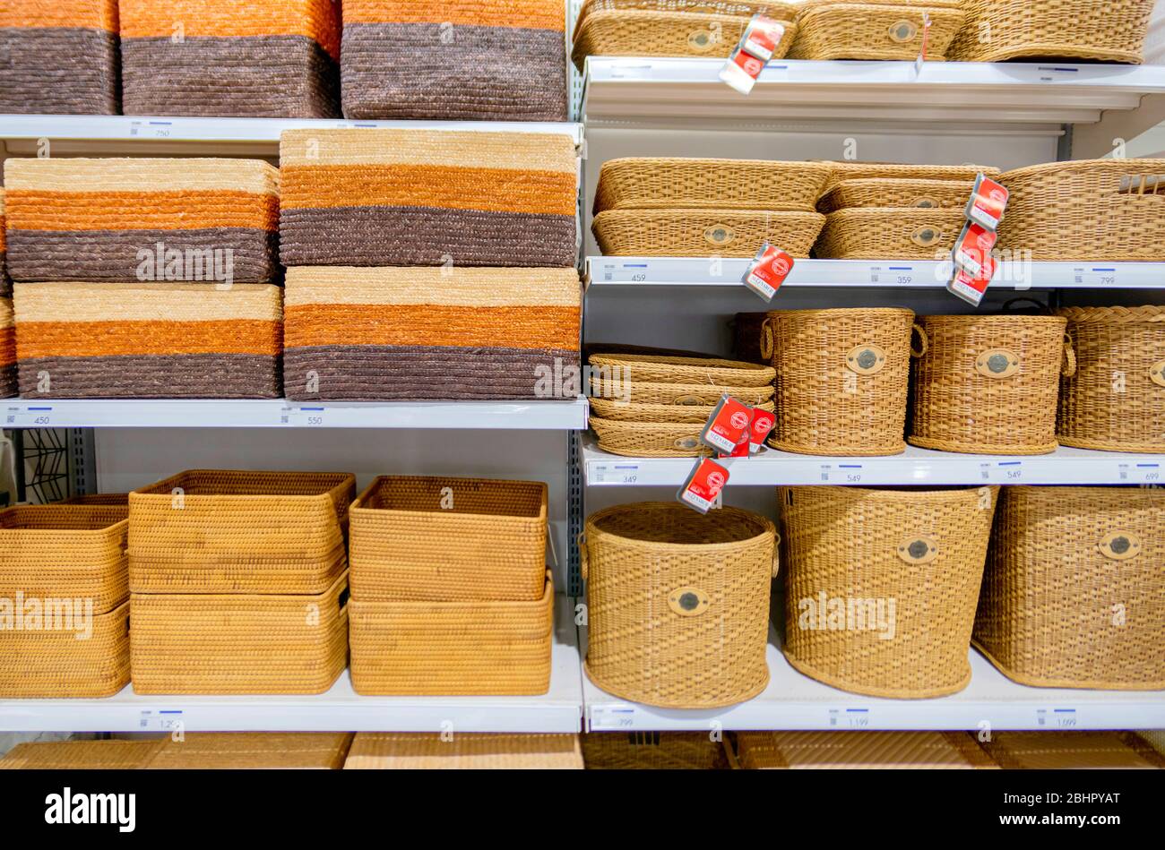 Brown weave baskets made of Hyacinth which were stacked on shelves in Homepro department store