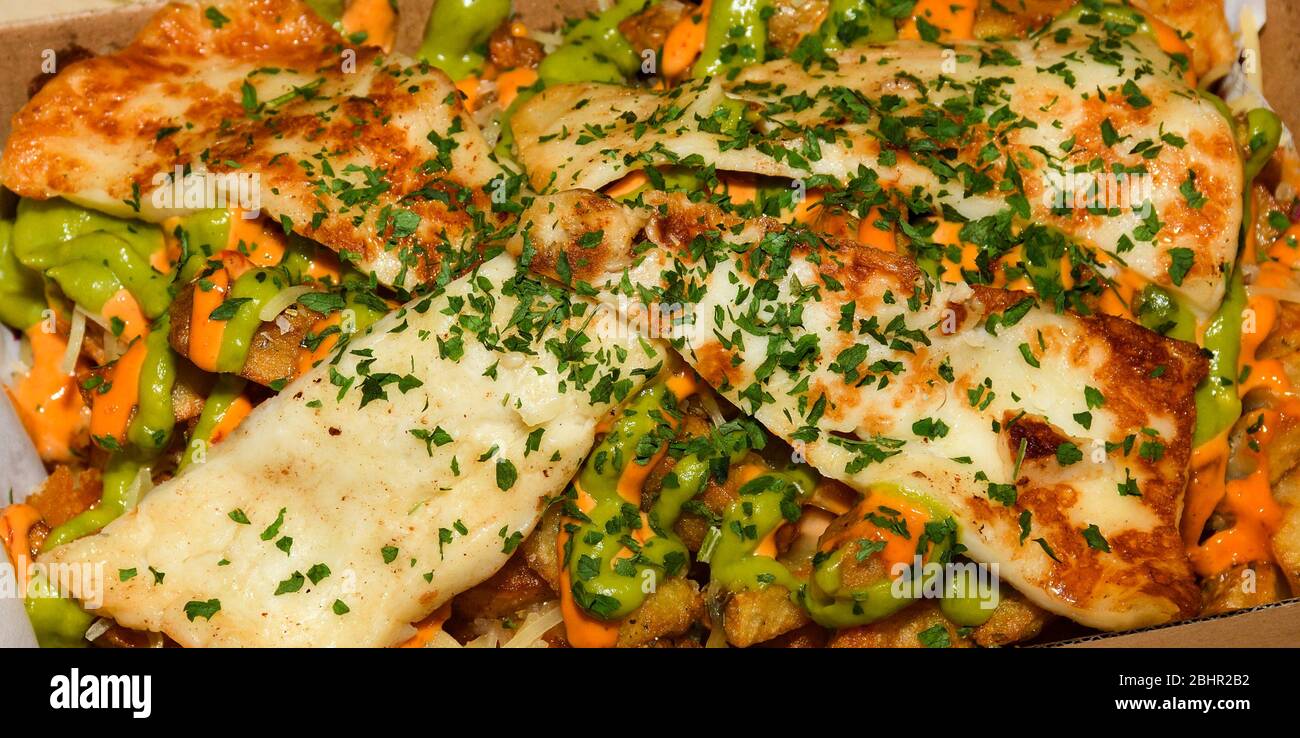 Disco french fries, gravy sauce mozzarella halloumi cheese potatoes