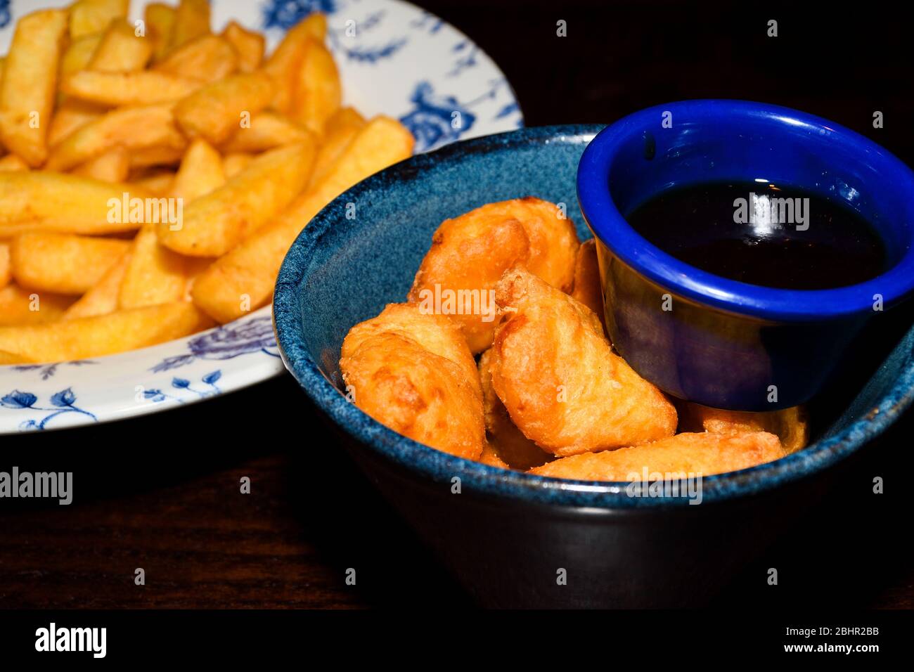 Disco french fries, gravy sauce mozzarella halloumi cheese potatoes