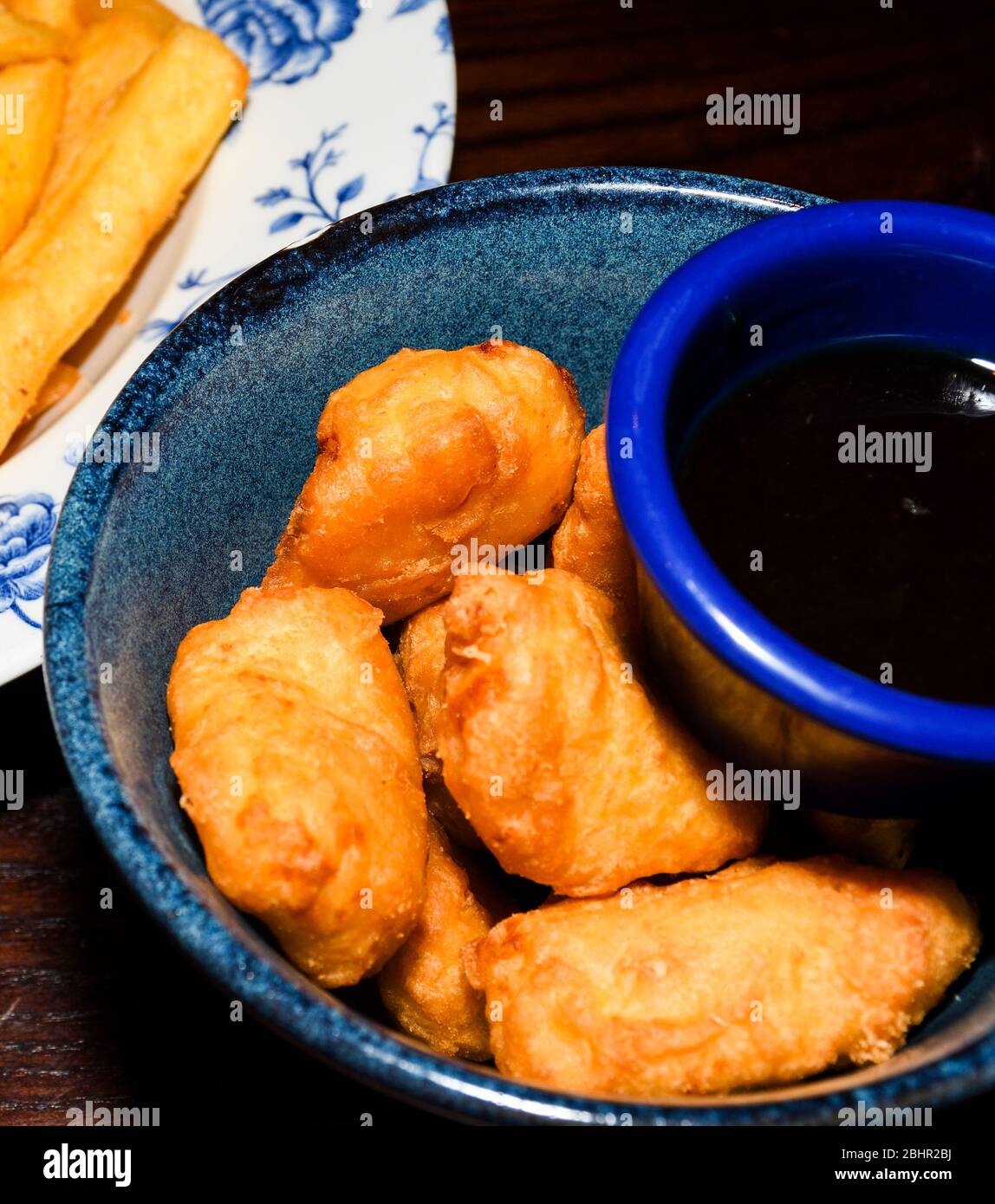 Disco french fries, gravy sauce mozzarella halloumi cheese potatoes, poutine dish. Cheese fries