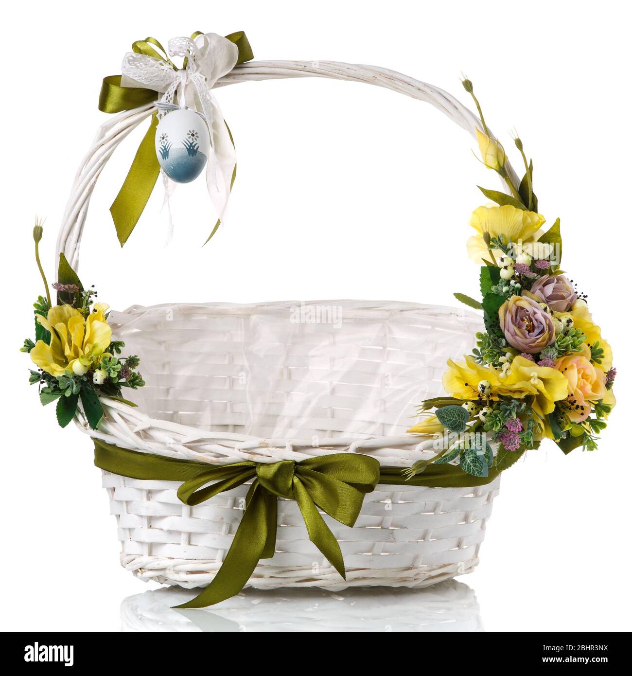 Floral composition with flowers, greenery and ribbons hanging on the