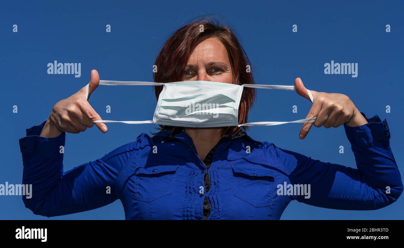 Put on a mask hi-res stock photography and images - Alamy