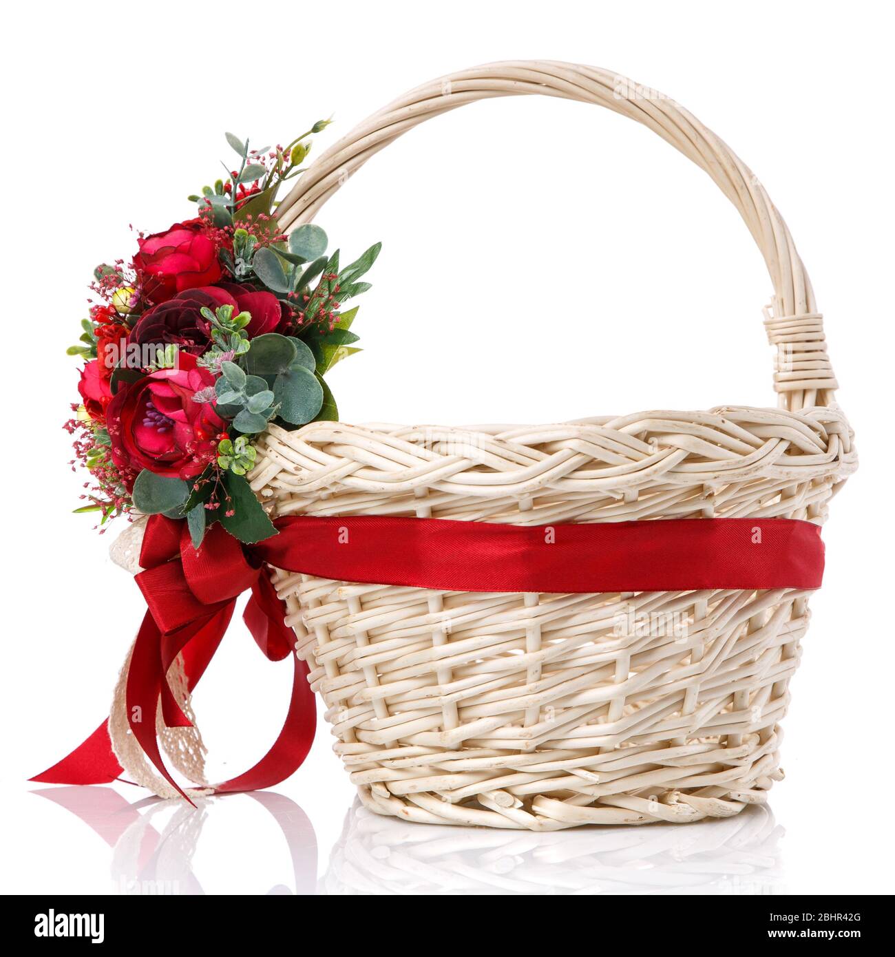 Easter basket made of natural vines with handmade decor in red. Basket