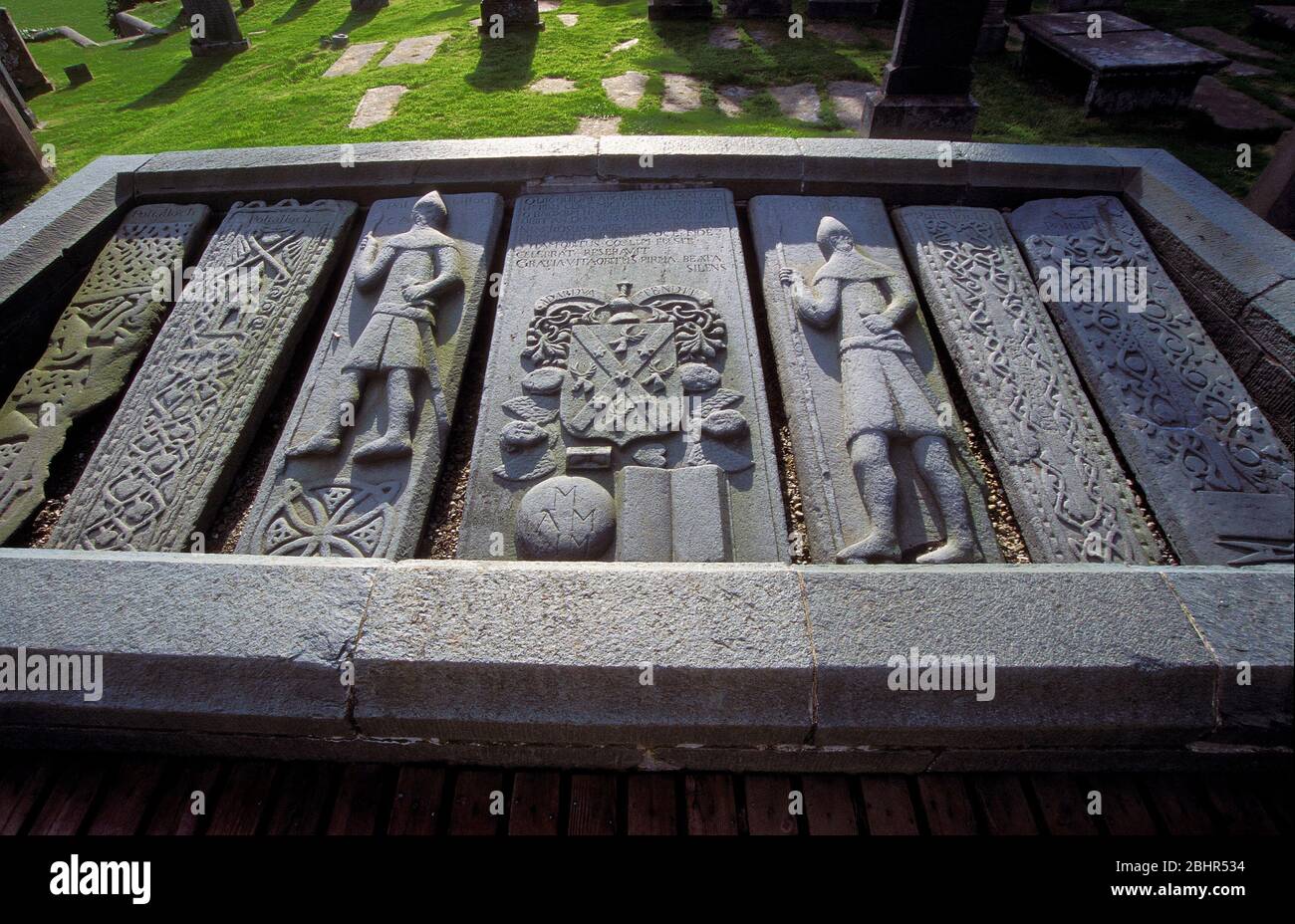 DETAIL OF SET OF 7 STONES WITH WARRIORS AND CELTIC DESIGNS IN KILMARTIN  CHURCH GRAVEYARD Stock Photo