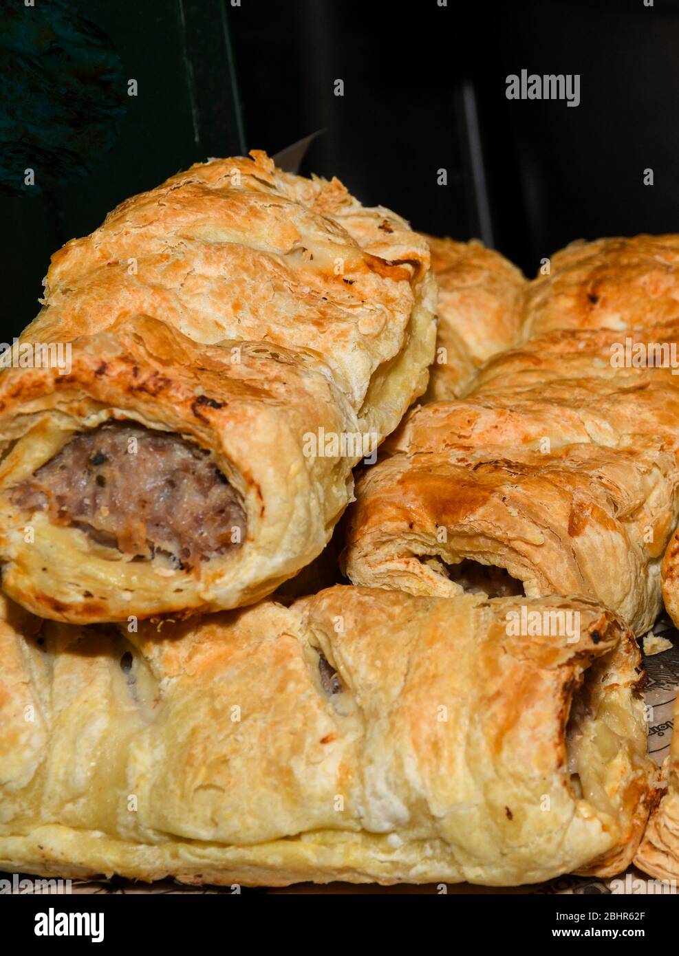 Traditional British puff pastry items, displayed in a bakery or pastry