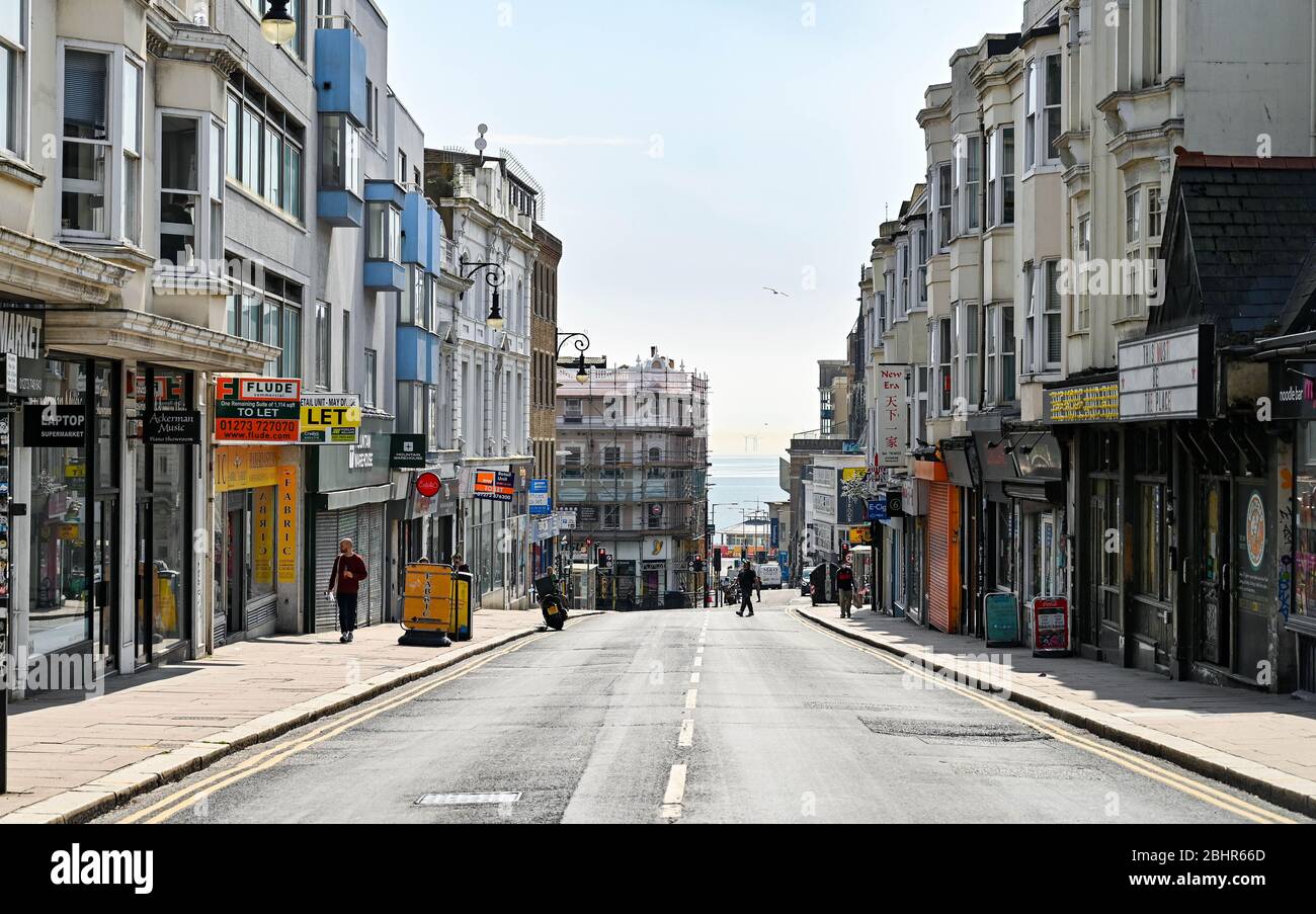 Brighton UK 27th April 2020 - Queens Road in the centre of Brighton is quiet as the lockdown restrictions continue during the Coronavirus COVID-19 pandemic crisis  . Credit: Simon Dack / Alamy Live News Stock Photo
