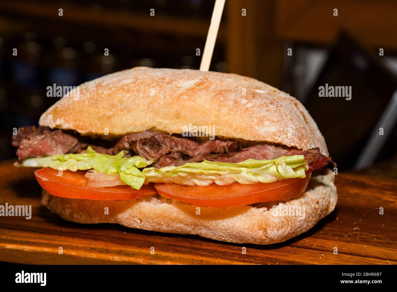 Sandwiches display during fast food festival outdoor event. Outside catering. Food Buffet Catering Dining Eating Party Sharing Concept. Meat, bacon, c Stock Photo