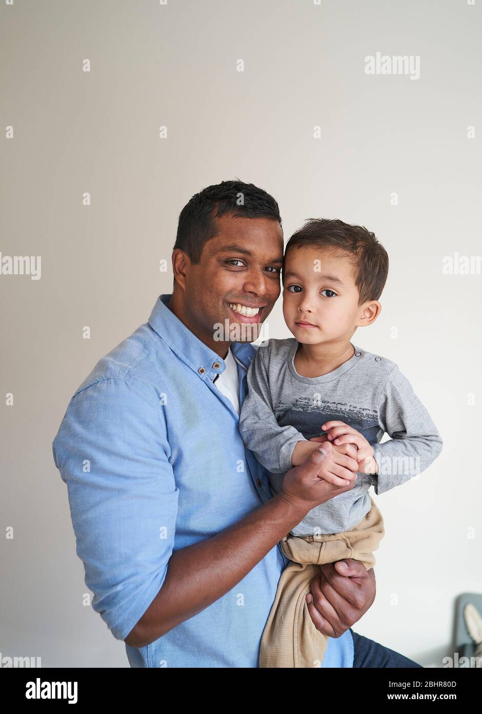 African father and son holding hands hi-res stock photography and ...