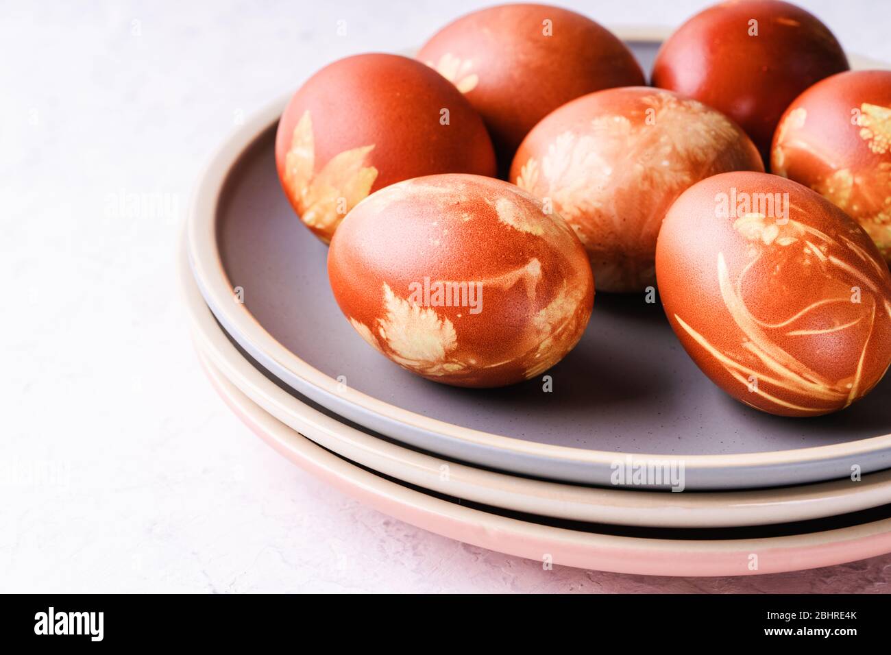 Naturally dyed with onion shells Easter eggs, springtime  plants, zero waste concept, sustainable living Stock Photo
