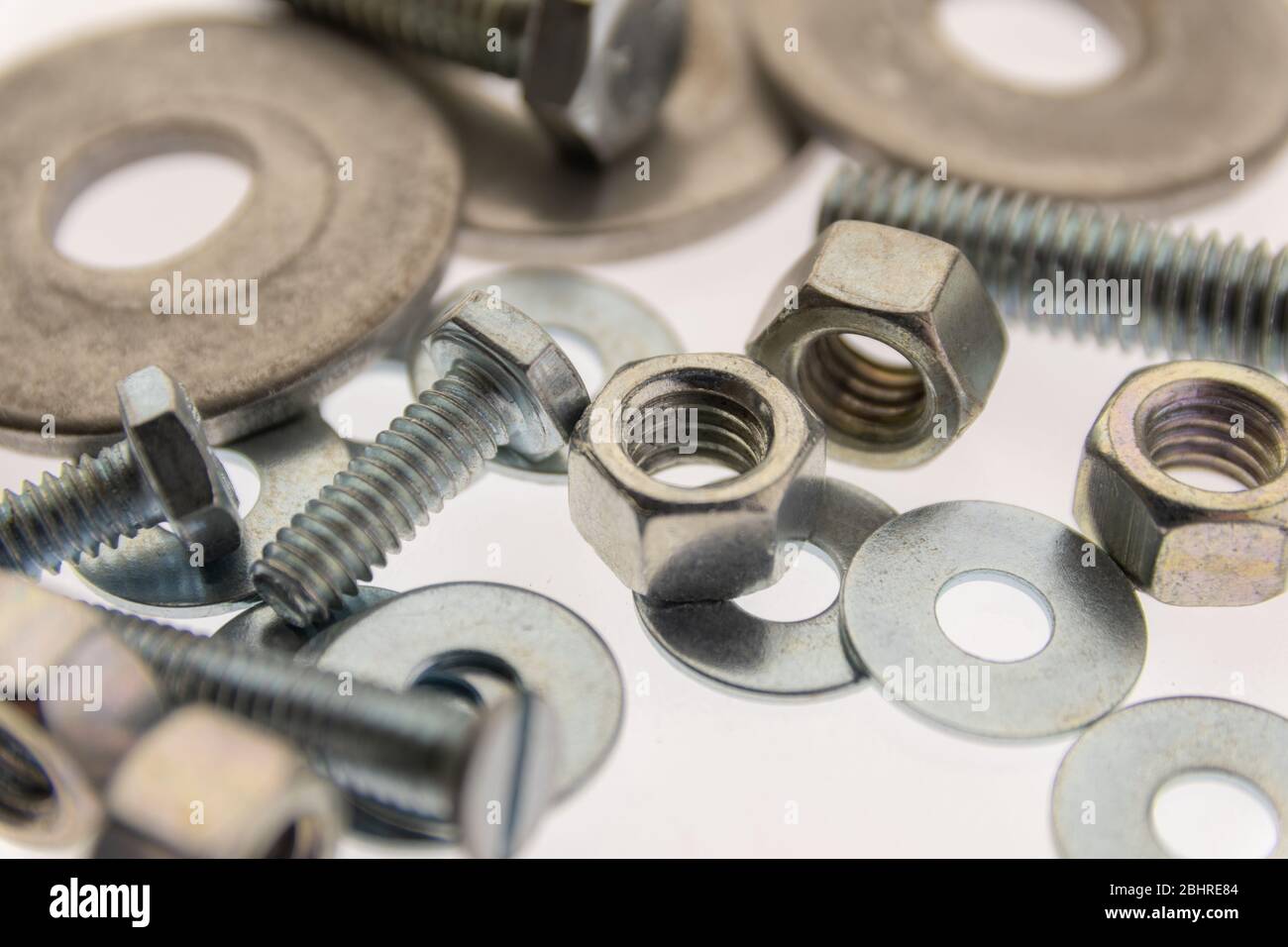 sheet metal and stainless steel screws together with hex nuts Stock Photo Alamy