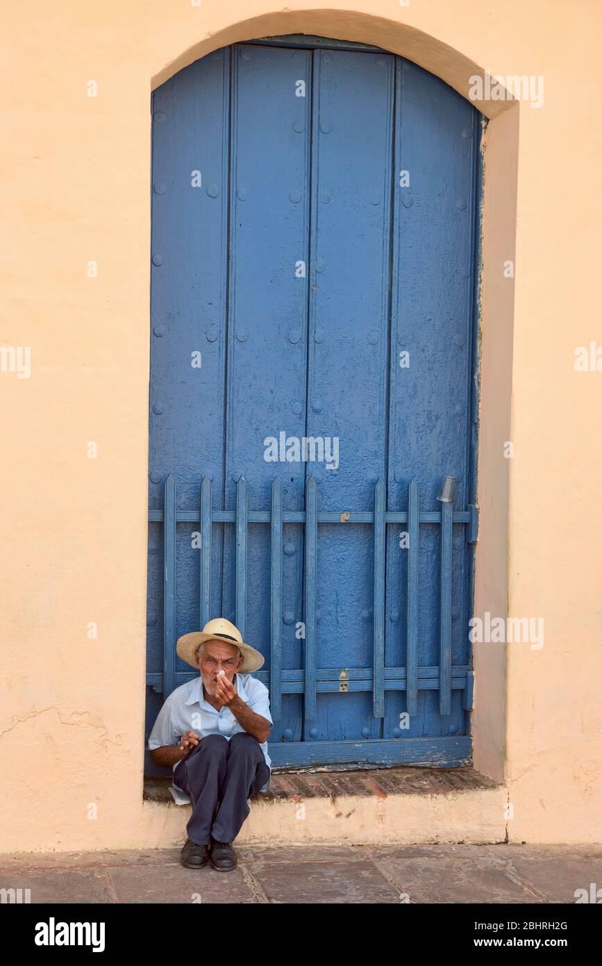 Old man begging for money, Trinidad, Cuba Stock Photo